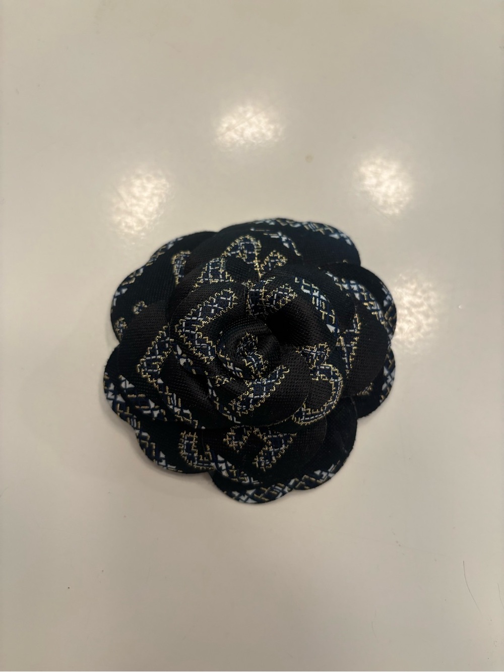 Chanel Camellia flower black and gold tweed
